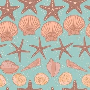 Beachy summer shells and starfish on seafood blue