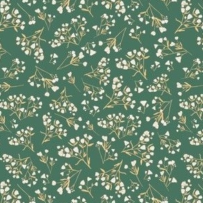 Tiny wildflower bunches in cream and yellow on green
