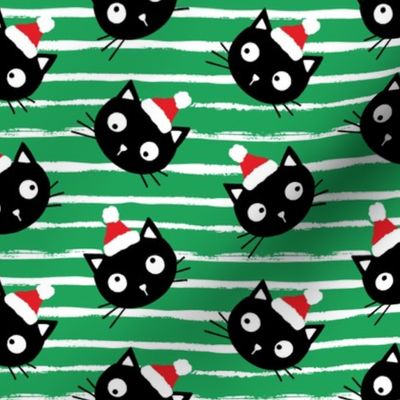 Cute Christmas black cats with santa hats, green white stripes, Christmas fabric WB23 medium scale