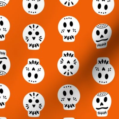 sugar skulls on orange