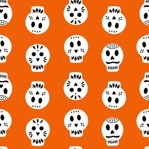 sugar skulls on orange