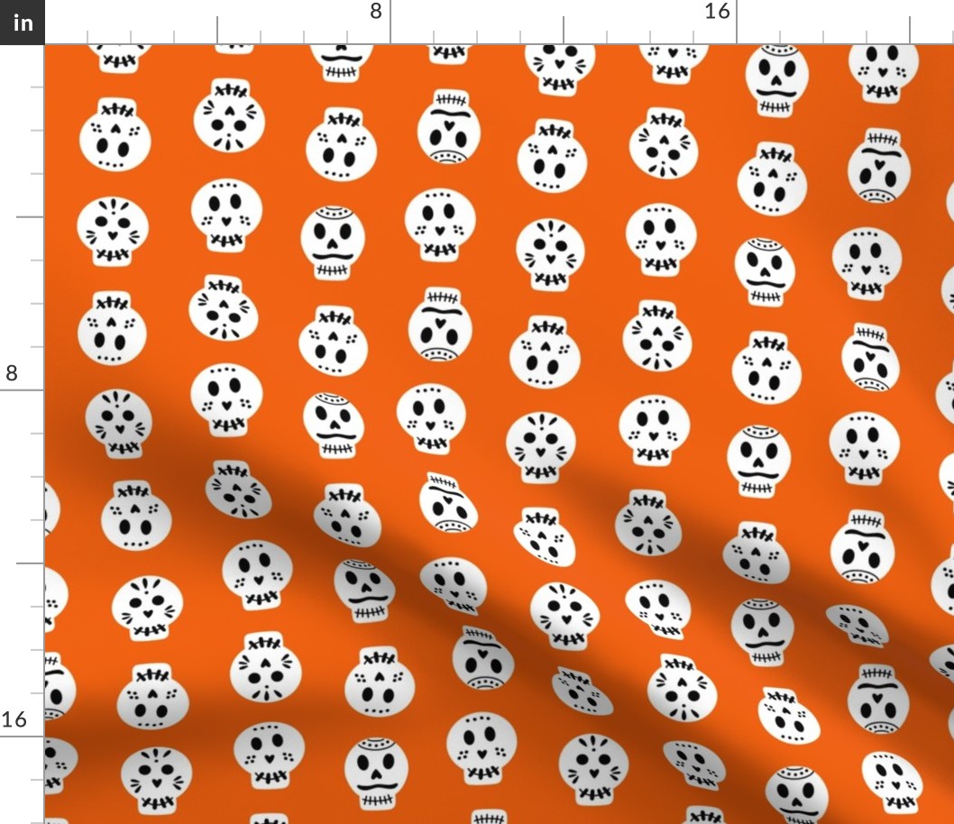 sugar skulls on orange