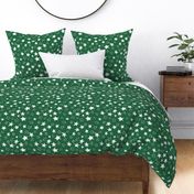 Holiday christmas watercolor white stars over emerald green background