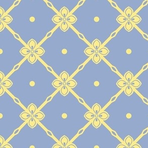 Yellow diagonal garden trellis with simple geometric flower on soft summer lavender blue