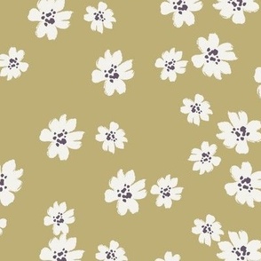 Ivory ditsy flowers tossed on yellow ochre