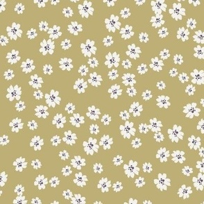 Ivory ditsy flowers tossed on yellow ochre