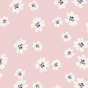 Ivory ditsy flowers tossed on muted pink