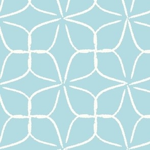Geometric retro circles ivory on blue wallpaper