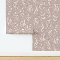 boho palm leaves and ethnic doodling on pale pink terracotta background