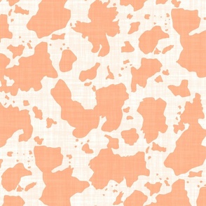 Cow Print in Peach on a White Background
