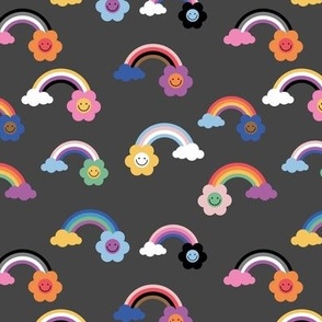 Proud retro rainbows and smileys - celebrating pride month lgbtq+ community design on charcoal gray