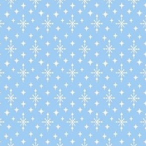 Retro stars and snowflakes in white on light blue