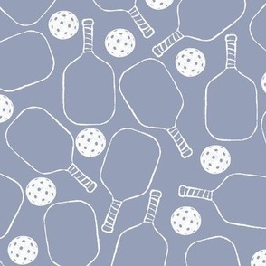 Pickleball hand drawn paddle and balls in crisp white on cornflower blue background
