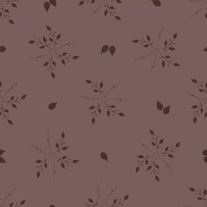 hand-drawn dark brown leaves and twigs like stars on marsala