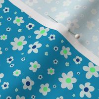 White, navy blue, and bright green ditsy daisies on blue, girl power - small print