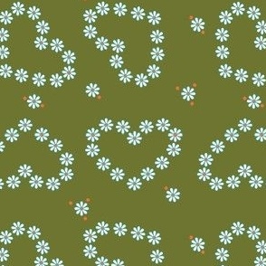 Retro Heart Shaped White Daisy Chain on Green Background