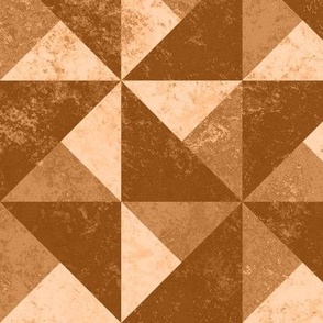 Distressed geometrics pinwheel in brown. Large scale