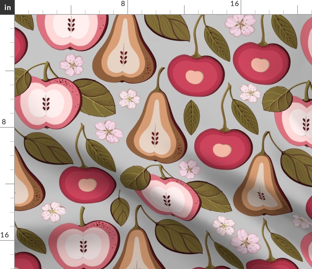 Fruit treats, pear, cherry and pink apples on a gray background