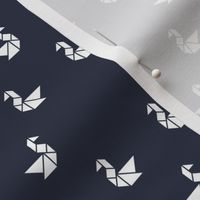 Tangram birds in white on navy (five ducks in a row)