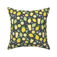 Summer squeeze lemonade - lemons and limes fruit garden drinks and flowers green yellow on charcoal