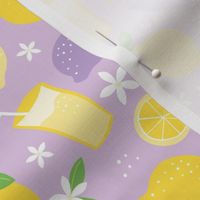 Summer squeeze lemonade - lemons and limes fruit garden drinks and flowers green yellow on lilac purple