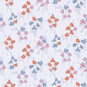 Purple, blue and orange flowers over purple background