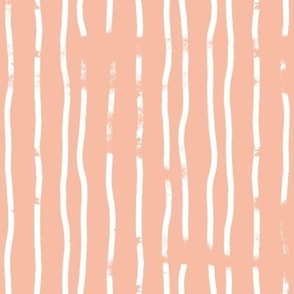 peach pink and white wobbly vertical textured candy stripe fabric and wallpaper