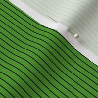 Thin black stripes on a green background