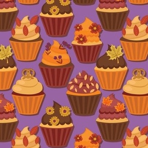 Autumn cupcakes on purple background