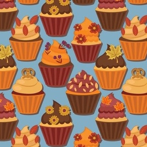 Autumn cupcakes on blue grey background