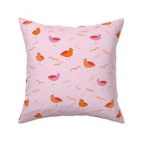 Medium coastal seagulls in pink and orange for girls swimwear and beach accessories