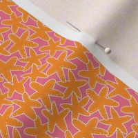 Tiny Starfish in bright pink and orange for summer coastal girls clothing and swimwear