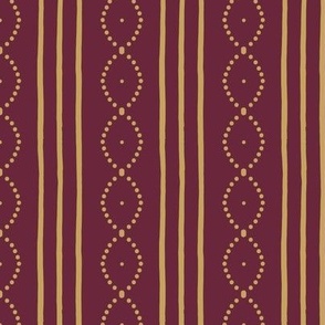 Classic Vintage hand-drawn stripes with curving dots in antique gold on wine red