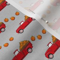 (small scale) fall vintage truck - falling  pumpkins - red on grey - C23