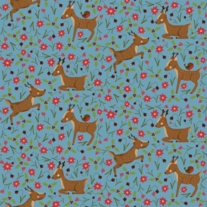 festive deers on light blue (larger scale)