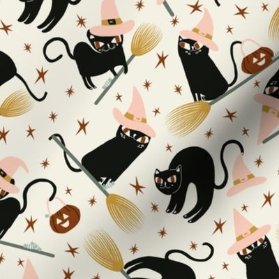 Black Witchy halloween cats & peach hats on cream