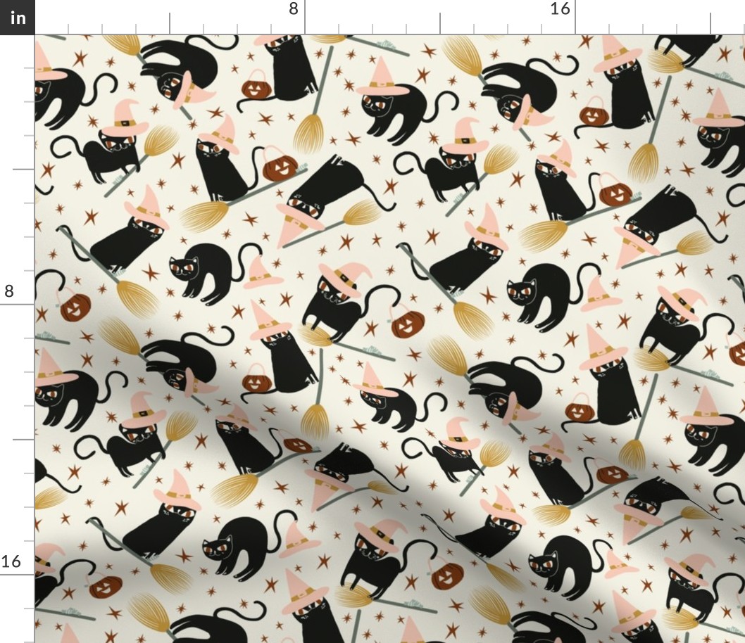 Black Witchy halloween cats & peach hats on cream
