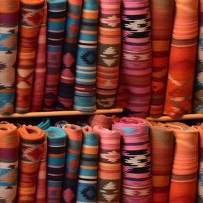 colorful hand loomed Navajo blankets at Indian Market Santa Fe