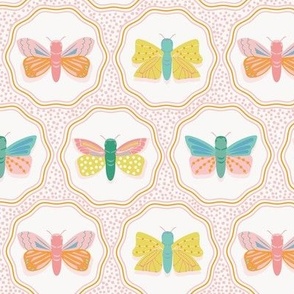 Small-Scale, sweet moth and butterfly print in colors of pink, lemon yellow, citrus green, soft orange, and blues.  
