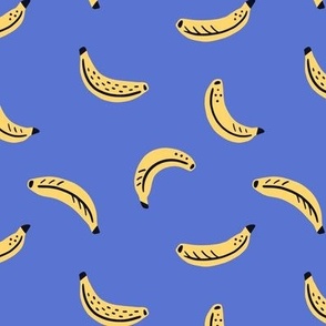 Graphic bananas on bright blue background - yellow tropical fruits - small scale