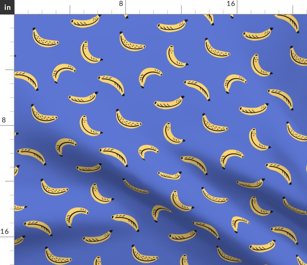 Graphic bananas on bright blue background - yellow tropical fruits - small scale