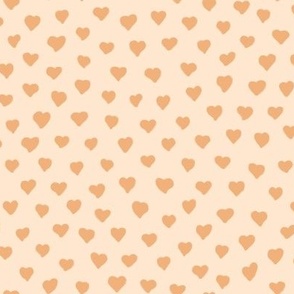 Tiny solid peachy orange and beige hearts 12x8in repeat