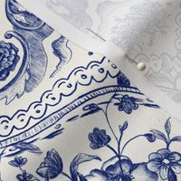 Medium scale Victorian china inspired delft blue floral ornamental pattern on cream