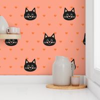 cute halloween black cats with hearts on coral orange