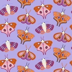 Small Magical Moths on Periwinkle Blue for Autumn and Halloween