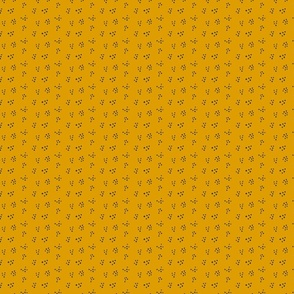 Dotty clusters on mustard yellow