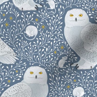 Birds of prey snowy owls on blue