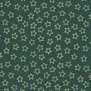 Sparkly gold stars on woven dark green background