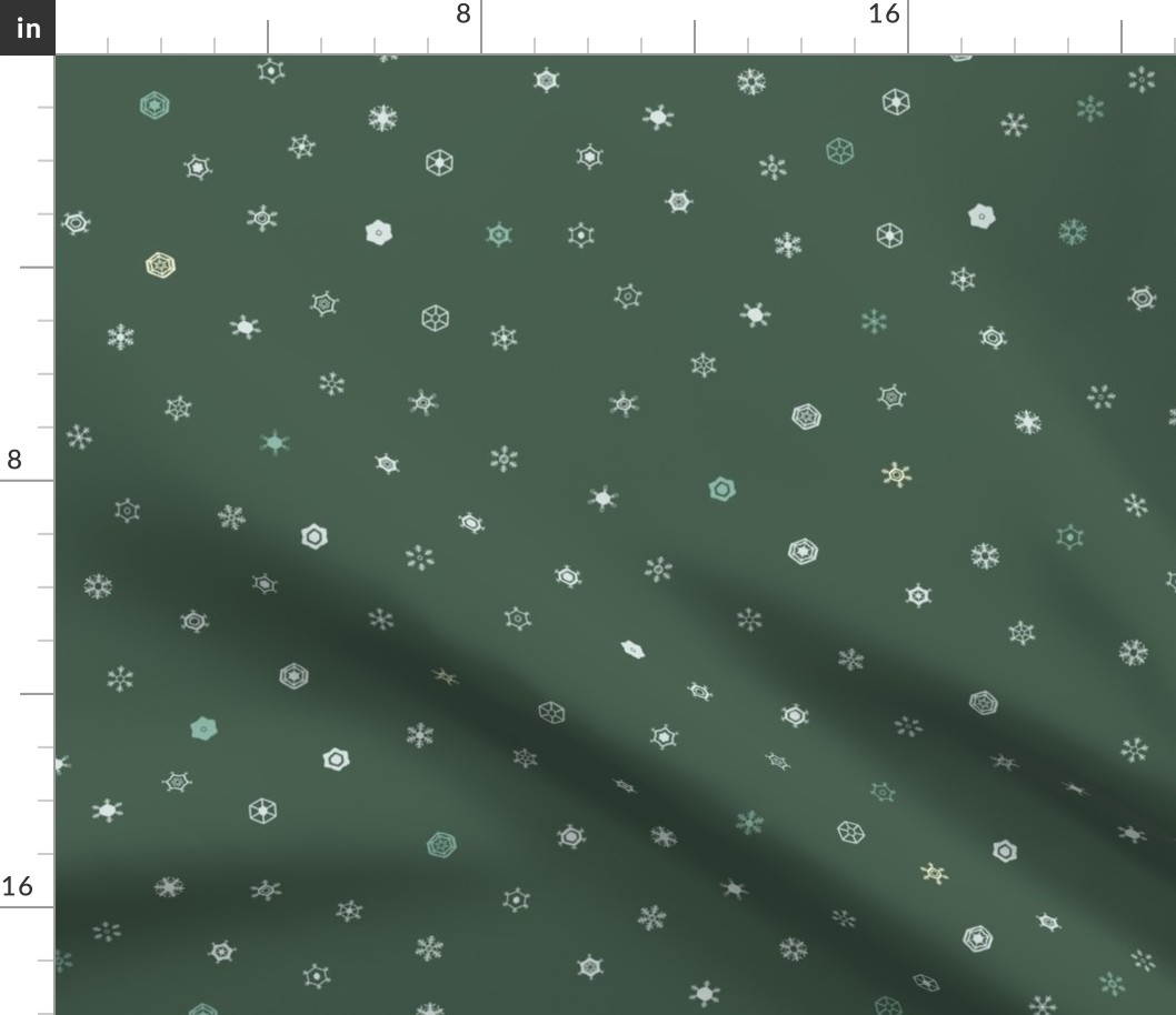Tiny Snowflakes Scattered on Green Background (medium)