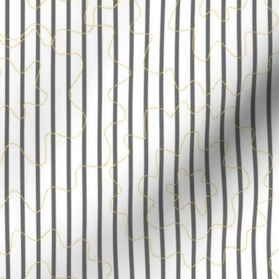 medium-Diagonally striped vertical narrow black lines and yellow orange floral contours on white